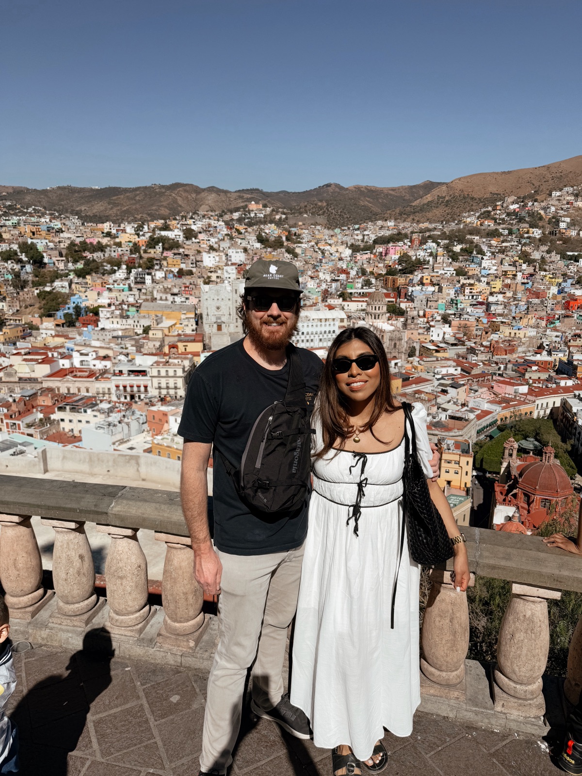 Adriana and Cameron above the colorful hills of Guanajuato