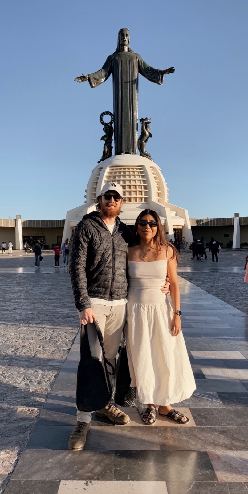 Adriana and Cameron at Cristo Rey at golden hour